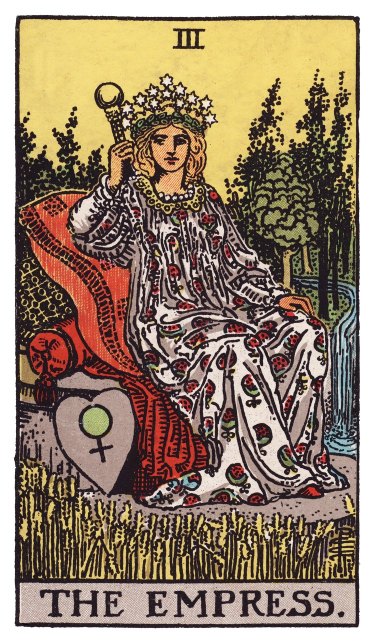 A seated figure on a cushioned throne in a field of wheat, a crown of twelve stars on her head, a Venus-marked shield at her side, red robes flowing, green abundance surrounding her.