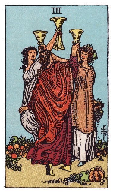Three figures dance in a ring with their cups lifted, gourds and grapes heaped at their feet.